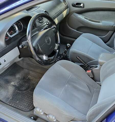 Синій Шевроле Лачетті, об'ємом двигуна 1.8 л та пробігом 229 тис. км за 3100 $, фото 9 на Automoto.ua