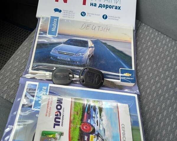 Синій Шевроле Лачетті, об'ємом двигуна 1.8 л та пробігом 223 тис. км за 4200 $, фото 19 на Automoto.ua