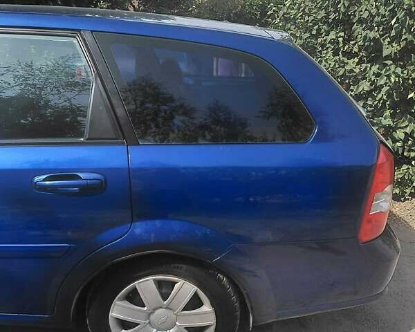 Синий Шевроле Лачетти, объемом двигателя 1.8 л и пробегом 300 тыс. км за 3976 $, фото 1 на Automoto.ua