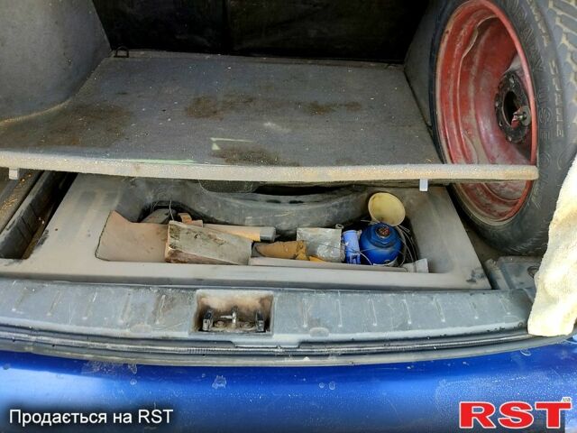 Синій Шевроле Лачетті, об'ємом двигуна 1.8 л та пробігом 333 тис. км за 4100 $, фото 3 на Automoto.ua