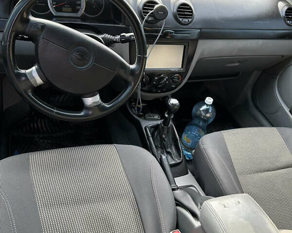 Синій Шевроле Лачетті, об'ємом двигуна 1.8 л та пробігом 270 тис. км за 2800 $, фото 12 на Automoto.ua