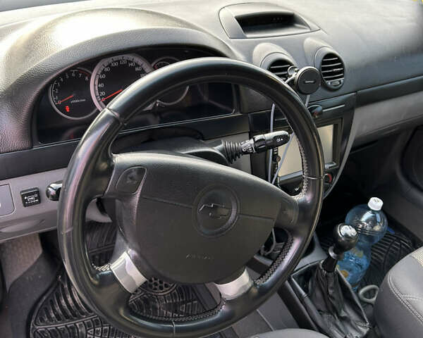 Синій Шевроле Лачетті, об'ємом двигуна 1.8 л та пробігом 270 тис. км за 2800 $, фото 10 на Automoto.ua