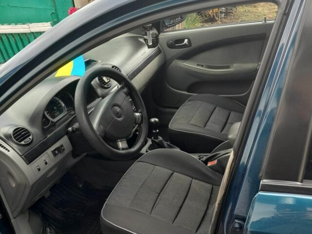 Синий Шевроле Лачетти, объемом двигателя 1.8 л и пробегом 116 тыс. км за 5600 $, фото 7 на Automoto.ua