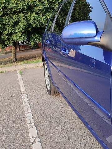 Синий Шевроле Лачетти, объемом двигателя 1.6 л и пробегом 233 тыс. км за 5200 $, фото 21 на Automoto.ua