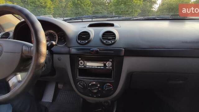 Синий Шевроле Лачетти, объемом двигателя 1.6 л и пробегом 233 тыс. км за 5200 $, фото 4 на Automoto.ua