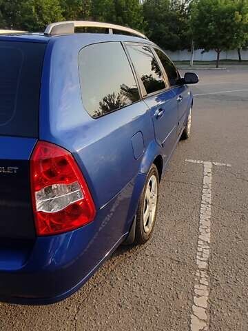 Синий Шевроле Лачетти, объемом двигателя 1.6 л и пробегом 233 тыс. км за 5200 $, фото 14 на Automoto.ua