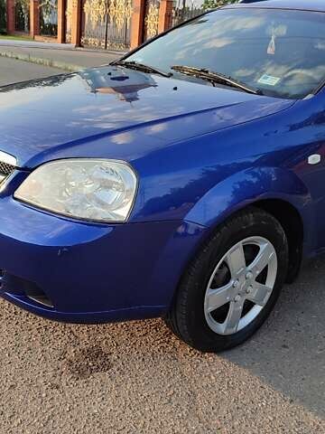 Синий Шевроле Лачетти, объемом двигателя 1.6 л и пробегом 233 тыс. км за 5200 $, фото 22 на Automoto.ua