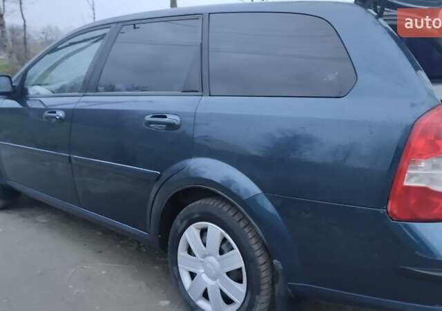 Синий Шевроле Лачетти, объемом двигателя 1.6 л и пробегом 239 тыс. км за 3700 $, фото 10 на Automoto.ua