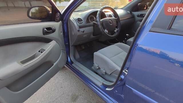 Синий Шевроле Лачетти, объемом двигателя 1.6 л и пробегом 233 тыс. км за 5200 $, фото 3 на Automoto.ua