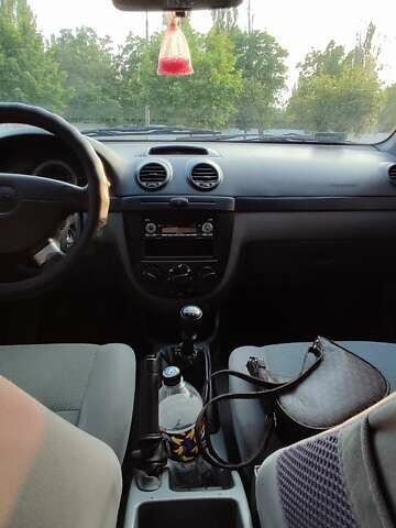 Синий Шевроле Лачетти, объемом двигателя 1.6 л и пробегом 233 тыс. км за 5200 $, фото 7 на Automoto.ua