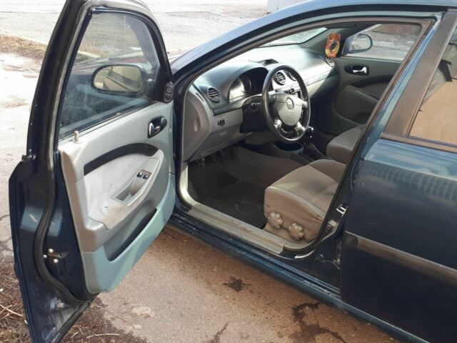 Синий Шевроле Лачетти, объемом двигателя 1.8 л и пробегом 300 тыс. км за 3500 $, фото 6 на Automoto.ua