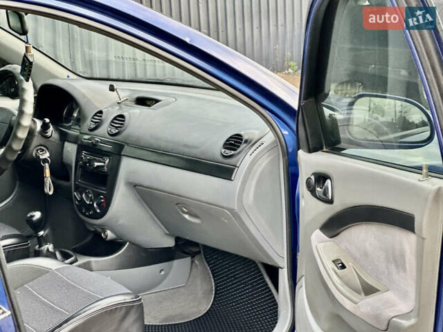 Синій Шевроле Лачетті, об'ємом двигуна 1.8 л та пробігом 186 тис. км за 4400 $, фото 14 на Automoto.ua