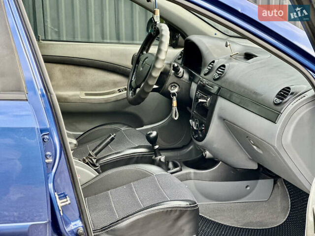 Синій Шевроле Лачетті, об'ємом двигуна 1.8 л та пробігом 186 тис. км за 4400 $, фото 15 на Automoto.ua