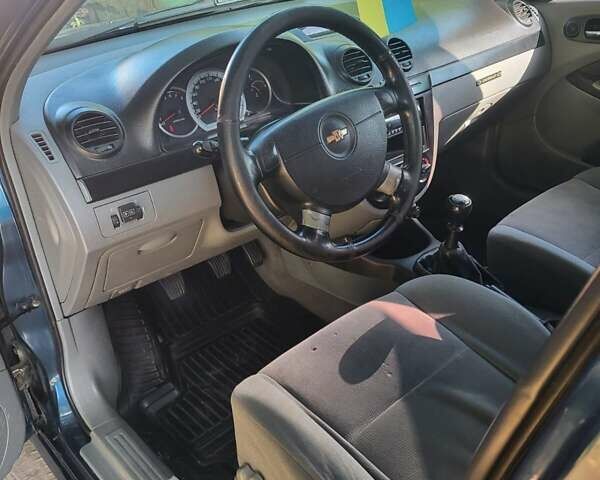 Синій Шевроле Лачетті, об'ємом двигуна 1.8 л та пробігом 228 тис. км за 5500 $, фото 5 на Automoto.ua
