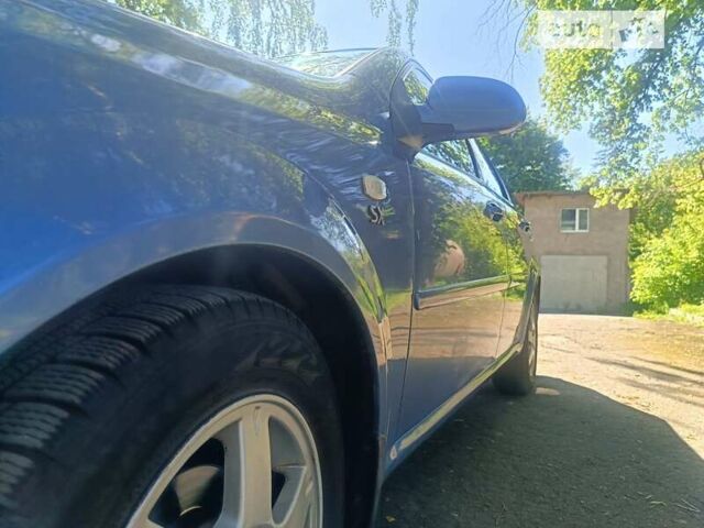 Синий Шевроле Лачетти, объемом двигателя 1.8 л и пробегом 228 тыс. км за 3200 $, фото 17 на Automoto.ua