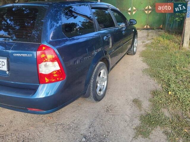 Синій Шевроле Лачетті, об'ємом двигуна 1.8 л та пробігом 228 тис. км за 5500 $, фото 4 на Automoto.ua
