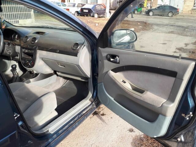 Синий Шевроле Лачетти, объемом двигателя 1.8 л и пробегом 300 тыс. км за 3500 $, фото 9 на Automoto.ua