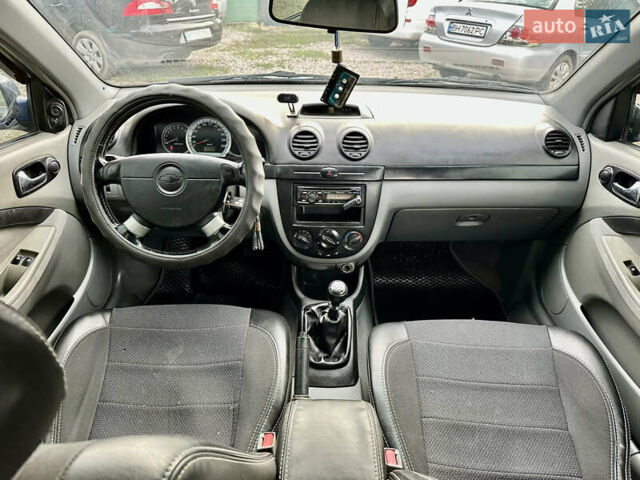 Синій Шевроле Лачетті, об'ємом двигуна 1.8 л та пробігом 186 тис. км за 4400 $, фото 17 на Automoto.ua