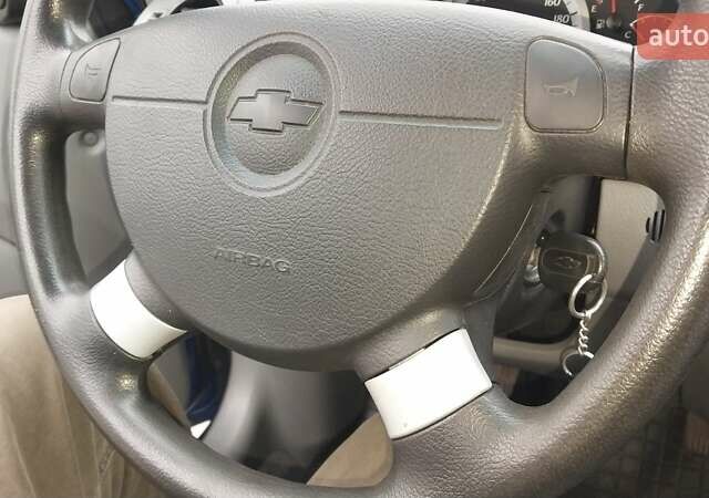 Синій Шевроле Лачетті, об'ємом двигуна 1.8 л та пробігом 221 тис. км за 5400 $, фото 29 на Automoto.ua