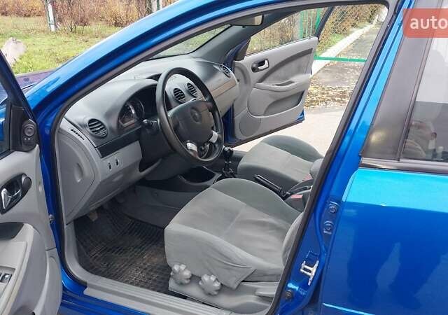 Синій Шевроле Лачетті, об'ємом двигуна 1.8 л та пробігом 221 тис. км за 5400 $, фото 28 на Automoto.ua