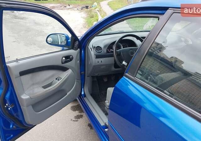 Синій Шевроле Лачетті, об'ємом двигуна 1.8 л та пробігом 221 тис. км за 5400 $, фото 32 на Automoto.ua