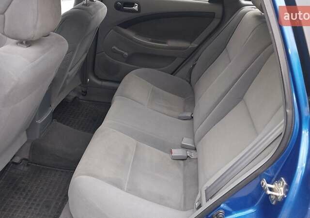 Синій Шевроле Лачетті, об'ємом двигуна 1.8 л та пробігом 221 тис. км за 5400 $, фото 34 на Automoto.ua