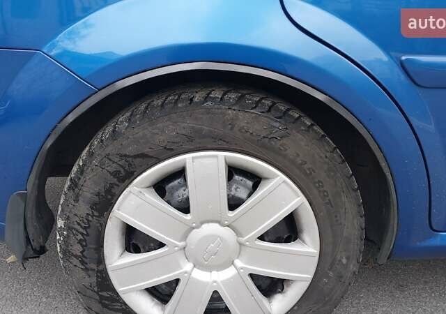 Синій Шевроле Лачетті, об'ємом двигуна 1.8 л та пробігом 221 тис. км за 5400 $, фото 17 на Automoto.ua