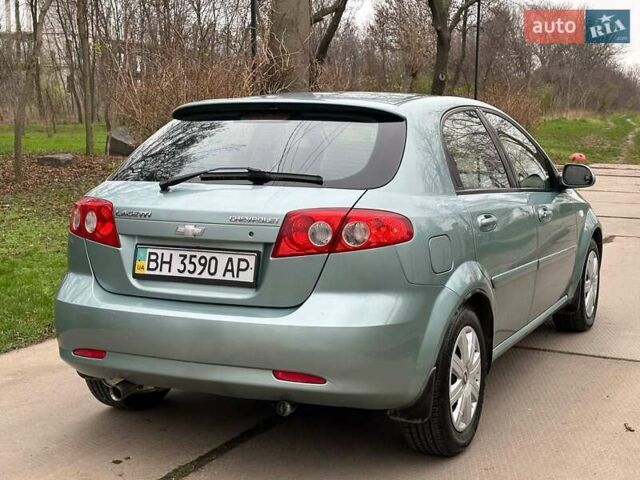 Зелений Шевроле Лачетті, об'ємом двигуна 1.8 л та пробігом 214 тис. км за 4100 $, фото 13 на Automoto.ua