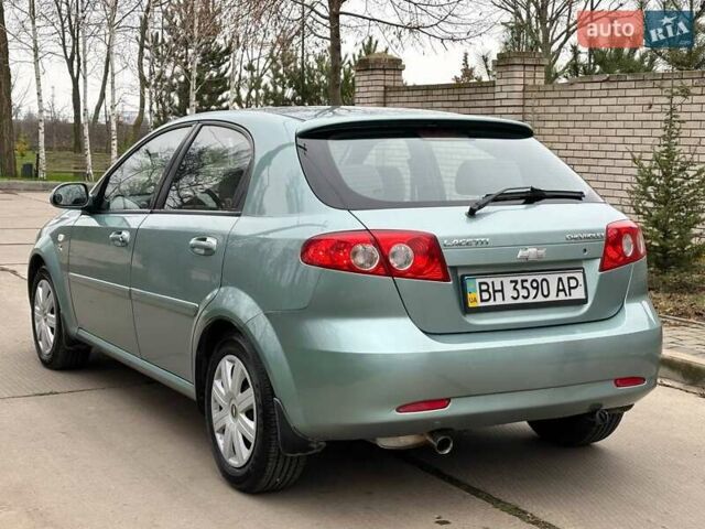 Зелений Шевроле Лачетті, об'ємом двигуна 1.8 л та пробігом 214 тис. км за 4100 $, фото 12 на Automoto.ua