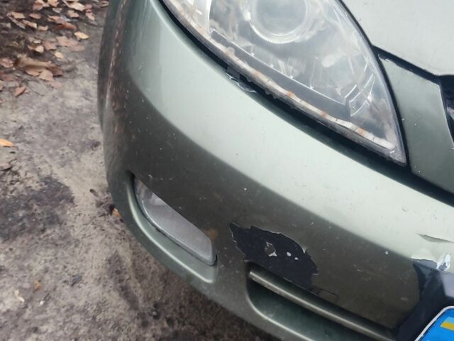 Зелений Шевроле Лачетті, об'ємом двигуна 1.8 л та пробігом 246 тис. км за 2000 $, фото 11 на Automoto.ua