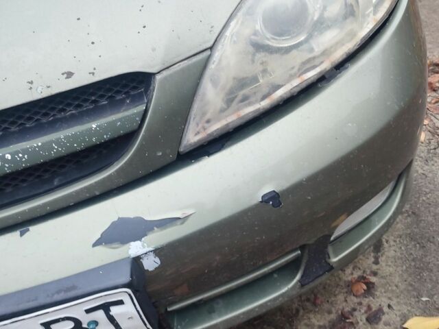 Зелений Шевроле Лачетті, об'ємом двигуна 1.8 л та пробігом 246 тис. км за 2000 $, фото 12 на Automoto.ua