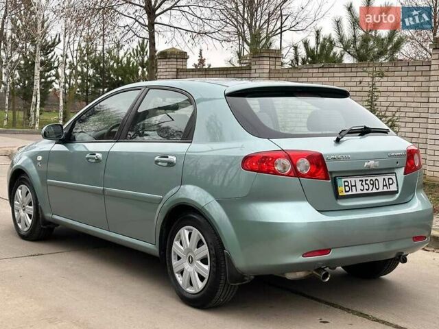 Зелений Шевроле Лачетті, об'ємом двигуна 1.8 л та пробігом 214 тис. км за 4100 $, фото 9 на Automoto.ua