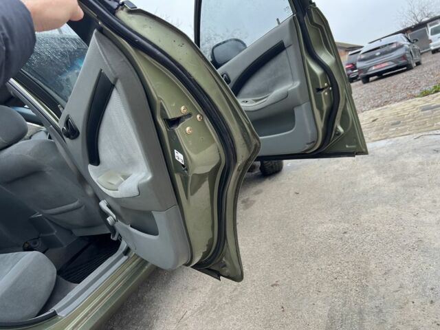 Зеленый Шевроле Лачетти, объемом двигателя 1.6 л и пробегом 190 тыс. км за 3350 $, фото 5 на Automoto.ua