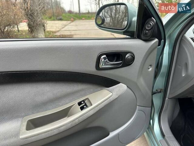 Зелений Шевроле Лачетті, об'ємом двигуна 1.8 л та пробігом 214 тис. км за 4100 $, фото 24 на Automoto.ua