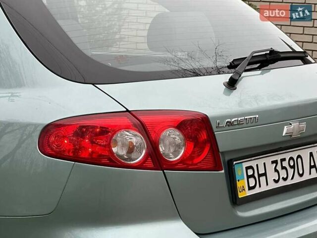 Зелений Шевроле Лачетті, об'ємом двигуна 1.8 л та пробігом 214 тис. км за 4100 $, фото 16 на Automoto.ua