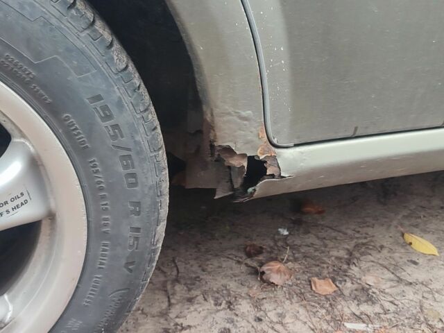 Зелений Шевроле Лачетті, об'ємом двигуна 1.8 л та пробігом 246 тис. км за 2000 $, фото 8 на Automoto.ua