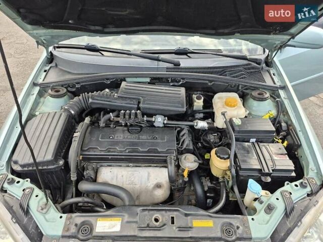 Зеленый Шевроле Лачетти, объемом двигателя 1.8 л и пробегом 203 тыс. км за 4200 $, фото 2 на Automoto.ua