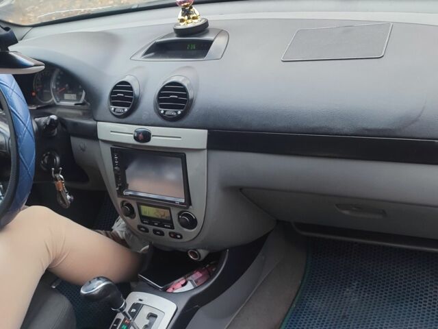 Зелений Шевроле Лачетті, об'ємом двигуна 1.8 л та пробігом 246 тис. км за 2000 $, фото 5 на Automoto.ua