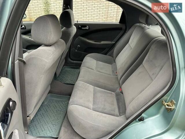 Зелений Шевроле Лачетті, об'ємом двигуна 1.8 л та пробігом 214 тис. км за 4100 $, фото 31 на Automoto.ua