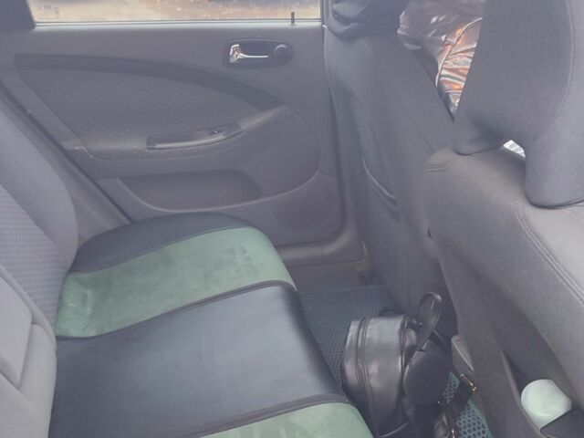 Зелений Шевроле Лачетті, об'ємом двигуна 1.8 л та пробігом 246 тис. км за 2000 $, фото 6 на Automoto.ua