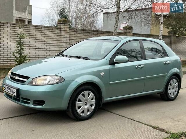Зелений Шевроле Лачетті, об'ємом двигуна 1.8 л та пробігом 214 тис. км за 4100 $, фото 4 на Automoto.ua