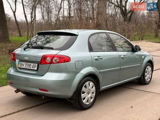 Зелений Шевроле Лачетті, об'ємом двигуна 1.8 л та пробігом 214 тис. км за 4100 $, фото 14 на Automoto.ua