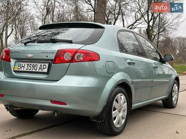 Зелений Шевроле Лачетті, об'ємом двигуна 1.8 л та пробігом 214 тис. км за 4100 $, фото 11 на Automoto.ua