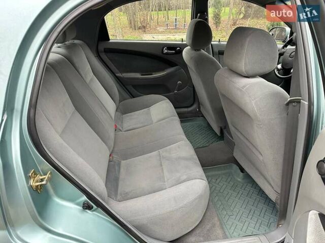 Зелений Шевроле Лачетті, об'ємом двигуна 1.8 л та пробігом 214 тис. км за 4100 $, фото 26 на Automoto.ua
