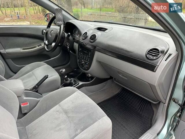 Зелений Шевроле Лачетті, об'ємом двигуна 1.8 л та пробігом 214 тис. км за 4100 $, фото 22 на Automoto.ua