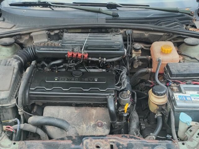 Зелений Шевроле Лачетті, об'ємом двигуна 1.8 л та пробігом 246 тис. км за 2000 $, фото 4 на Automoto.ua