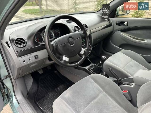Зелений Шевроле Лачетті, об'ємом двигуна 1.8 л та пробігом 214 тис. км за 4100 $, фото 30 на Automoto.ua