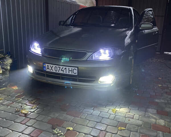 Зелений Шевроле Лачетті, об'ємом двигуна 1.8 л та пробігом 220 тис. км за 4100 $, фото 6 на Automoto.ua