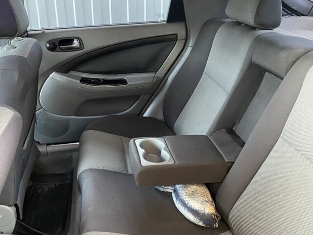 Зелений Шевроле Лачетті, об'ємом двигуна 1.8 л та пробігом 221 тис. км за 4200 $, фото 9 на Automoto.ua