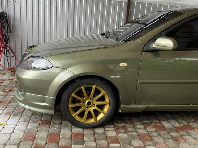 Зелений Шевроле Лачетті, об'ємом двигуна 1.8 л та пробігом 221 тис. км за 4200 $, фото 3 на Automoto.ua